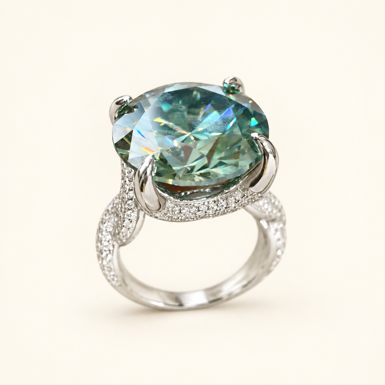 Style reference: pale teal statement ring with a clear-stone shoulder design